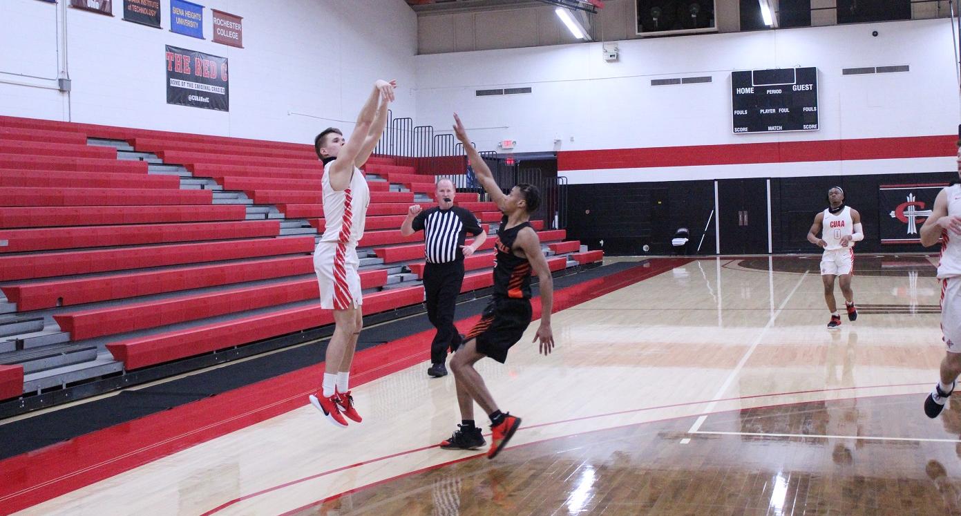 Men's basketball cruises past Greenville in first win of the season