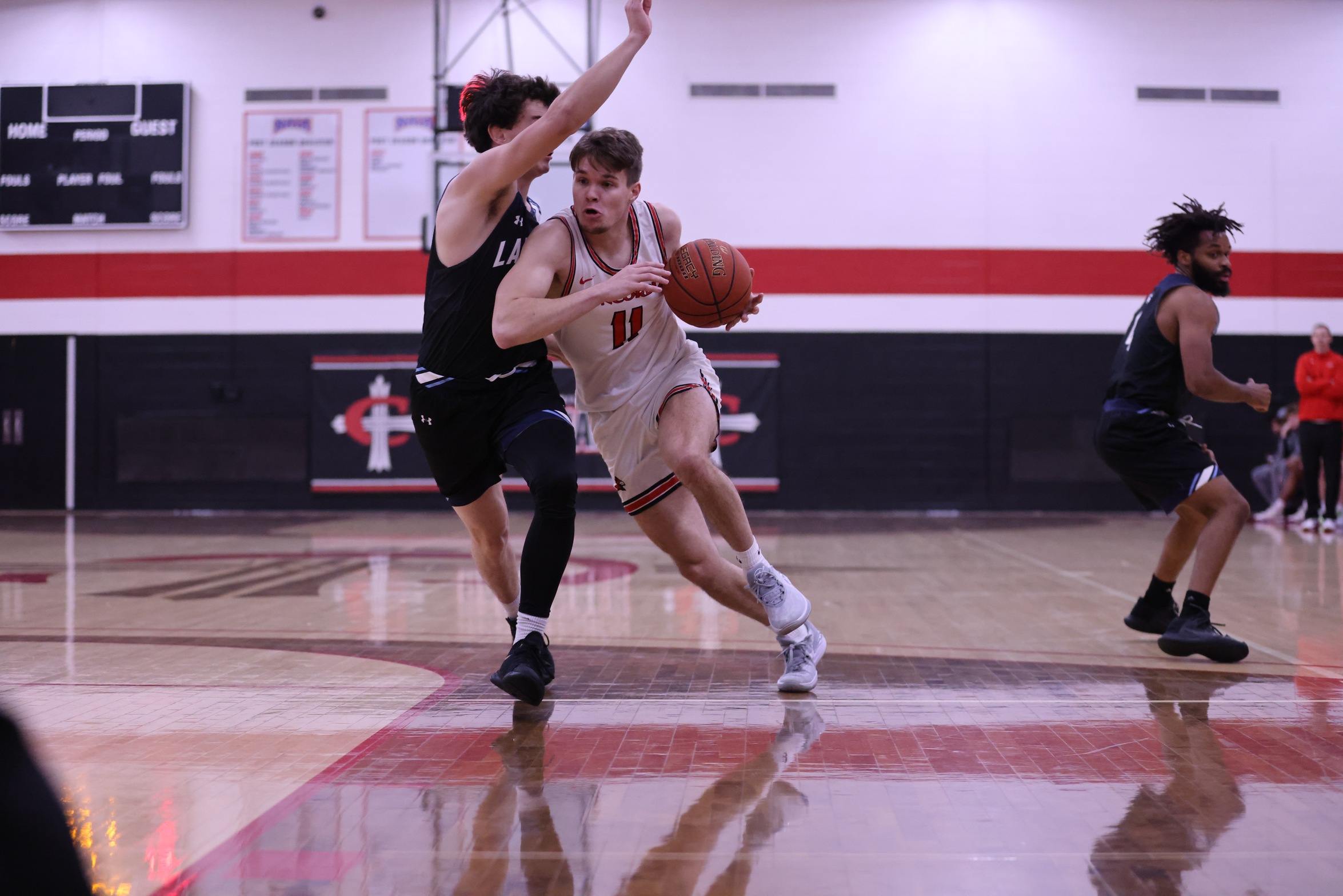 Men's Basketball overpowers Lambton 104-65