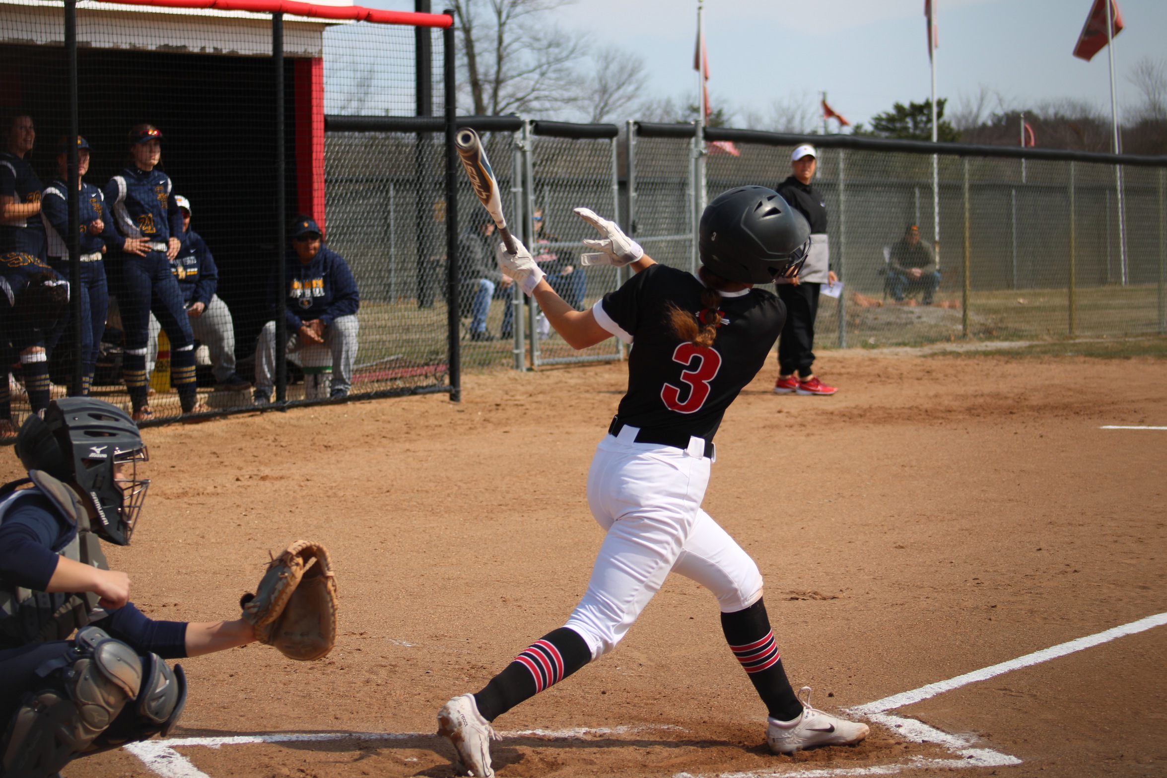 Softball splits pair of contests at #RV Madonna
